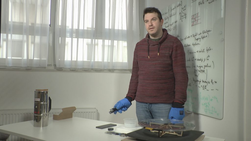 Dr. Tilen Knaflič demonstrates magnetic levitation.